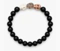 Triple Hand craved Skull Bracelet