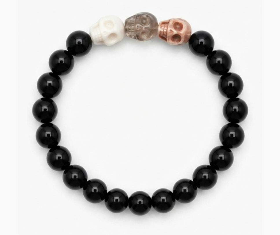 Triple Hand craved Skull Bracelet